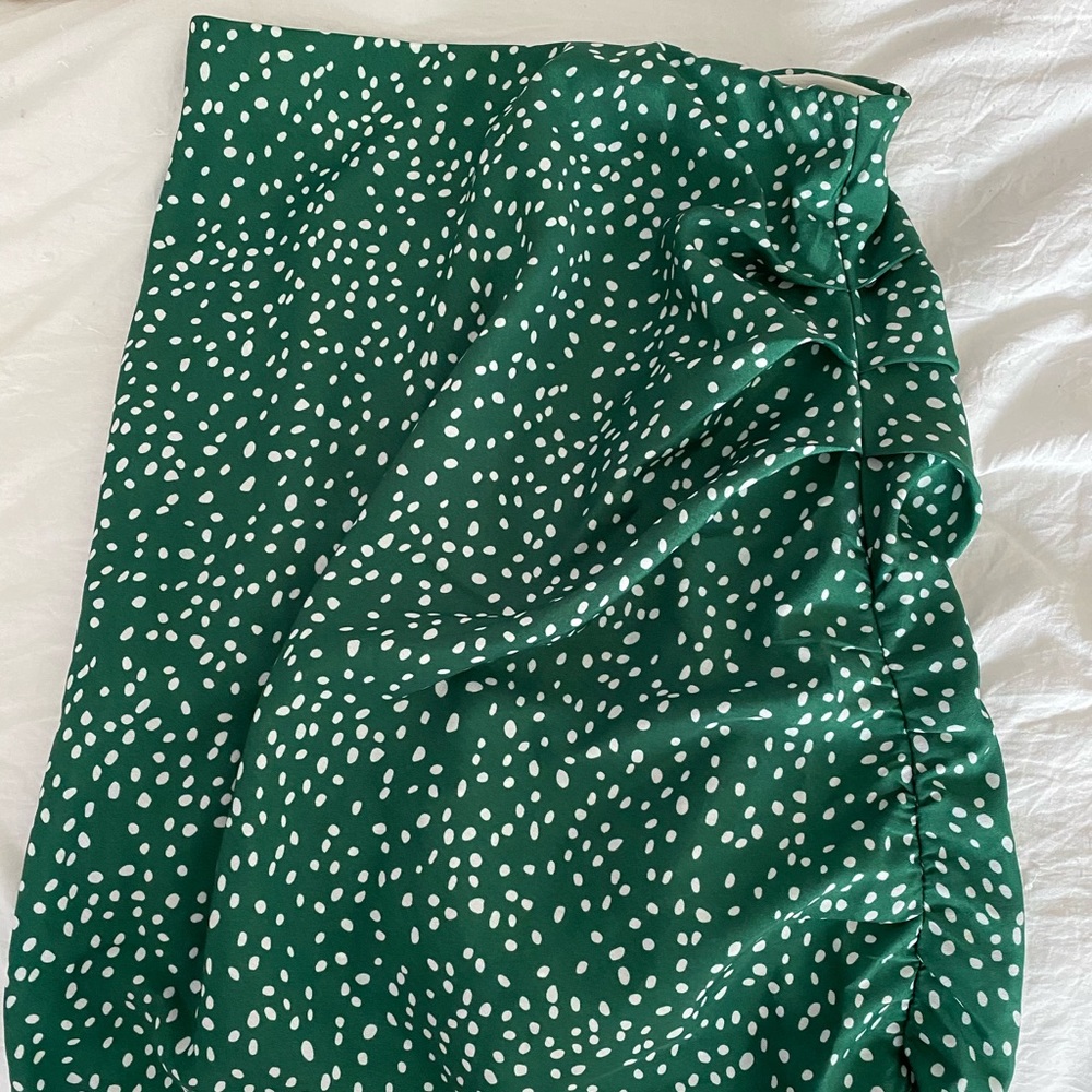 green and white polka dot skirt